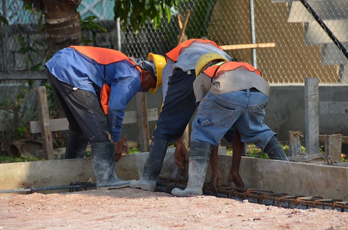 This is an image of concrete contractors preparing for a concrete foundation installation.